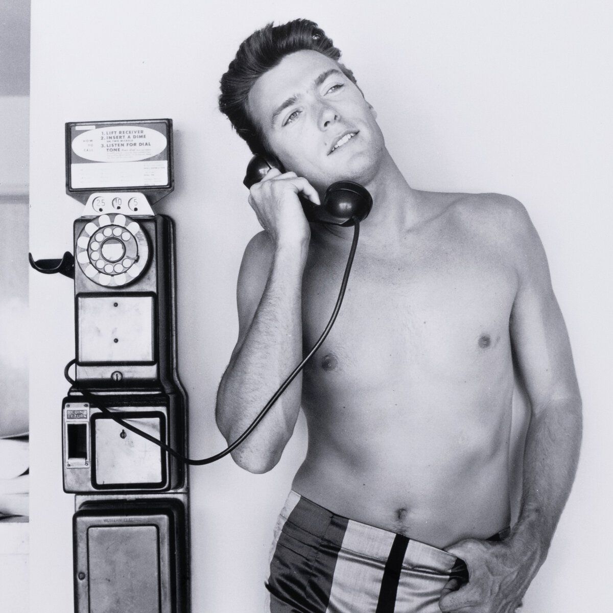 Clint Eastwood Takes A Call By Getty Images