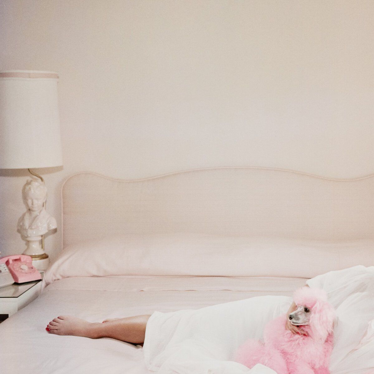 Joan Collins Relaxes By Slim Aarons